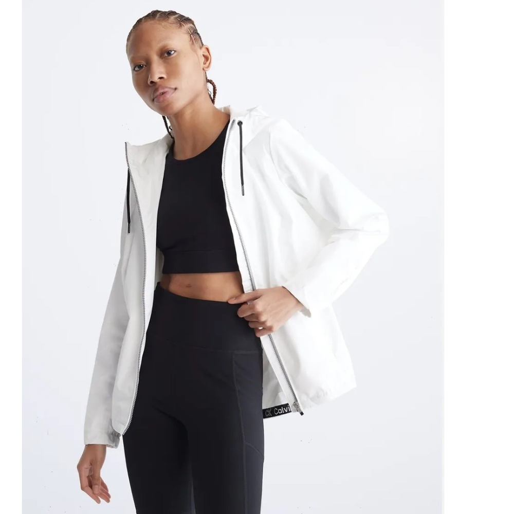 Calvin Klein Performance Side Snap Zip Hooded
Windbreaker Jacket - Women's Small
